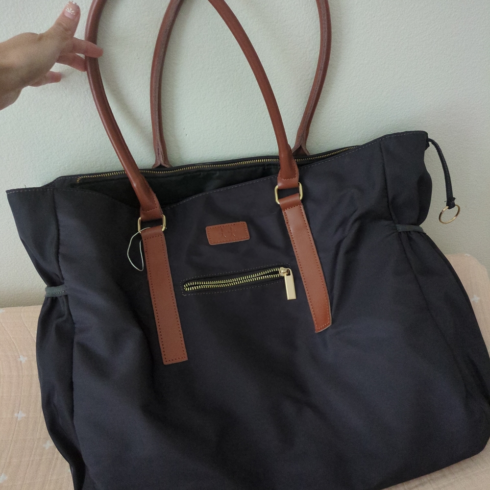 Elegant Black Tote Bag with Brown Accents